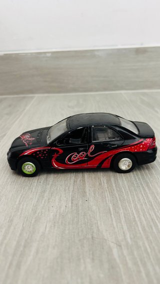 Coche de juguete negro para coleccionar