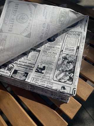 Papel antigrasa estilo periódico