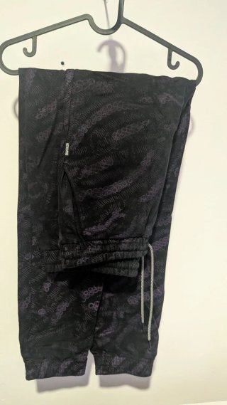 Pantalones Octopus negros y morados