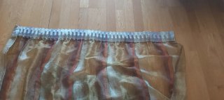 Tende con design a righe verticali in vari toni