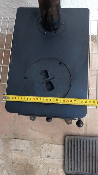 Estufa de exterior con rejilla