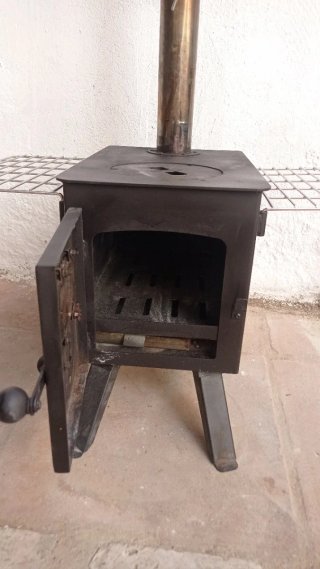Estufa de exterior con rejilla