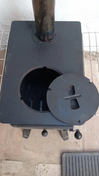 Estufa de exterior con rejilla