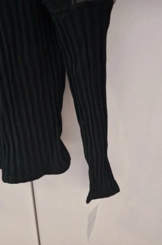 Jersey negro manga abullonada tul plumeti Glowrias