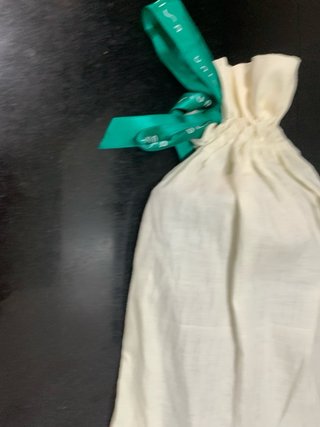 Bolso fiesta Unisa piel gris detalle metálico