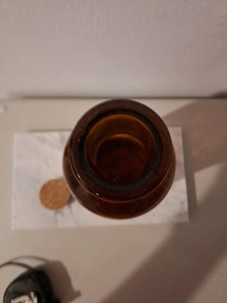 Frasco de farmacia antiguo ámbar