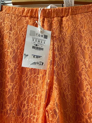 Pantalón naranja encaje Pull&Bear