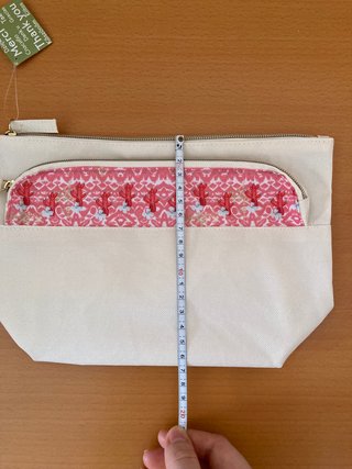 Neceser beige con adorno coral
