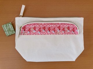Neceser beige con adorno coral