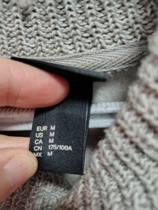 Sudadera polar H&M gris con cuello y puños punto
