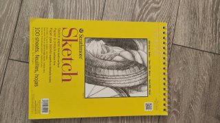 Caja libros, cuadernos dibujo, acuarela y lápices