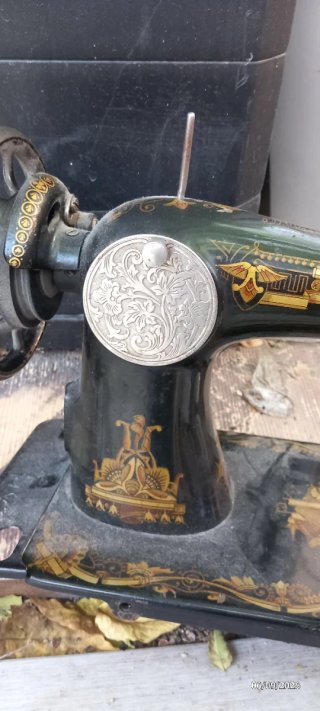Máquina de coser Singer esfinge antigua