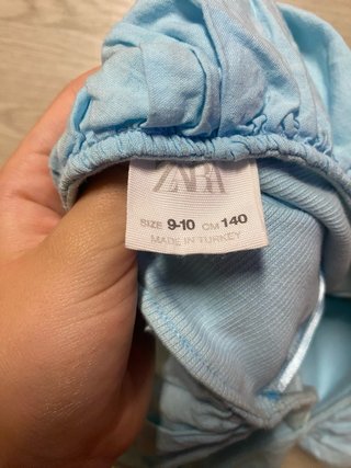 Top Zara manga volante asimétrico talla niña 9-10