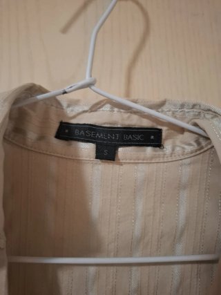 Blusa beige con rayas