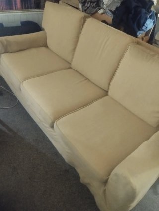 Sofá beige de tela seminuevo