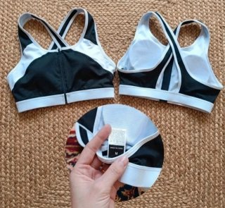 Top deportivo cremallera negro y blanco Talla M