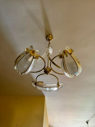 Lámparas de cristal y metal doradas