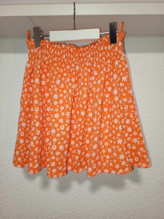 Falda C&A Naranja Flores Blancas