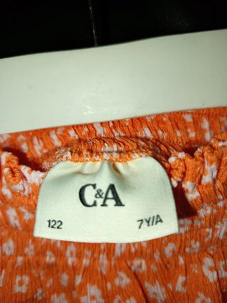 Falda C&A Naranja Flores Blancas