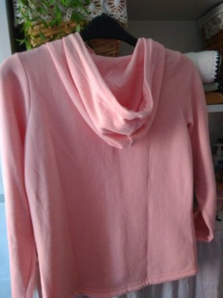 Sudadera rosa con capucha y bolsillos Clockhouse