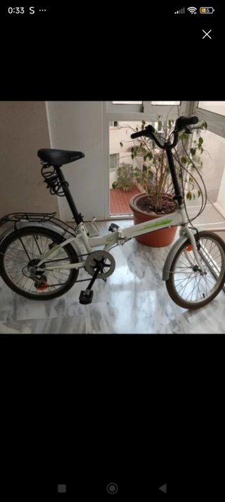 Bicicleta plegable blanca