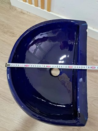 Lavamanos de cerámica azul