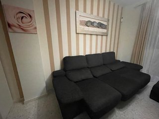 Sofá de tela marron en buen estado