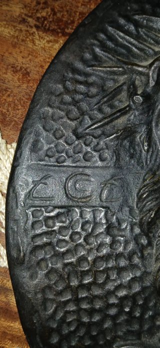 Placca in bronzo con volto di Cristo