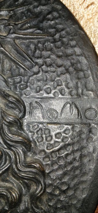 Placca in bronzo con volto di Cristo