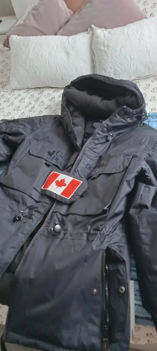 Anorak azul marino Talla 36/38. Perfecto estado