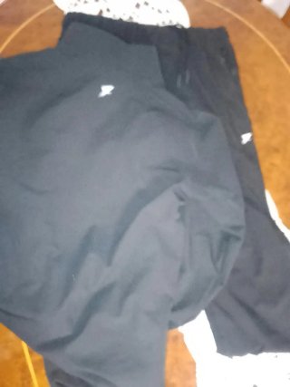 Chándal negro reflectante deportivo