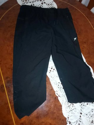 Chándal negro reflectante deportivo