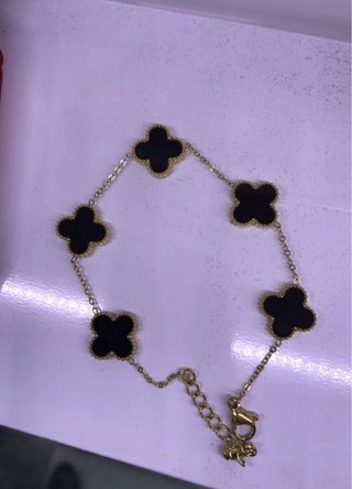 Pulsera Van Cleef & Arpels Negra y Dorada