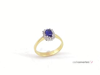 anillo oro 18k con piedra con diamante,zafiro