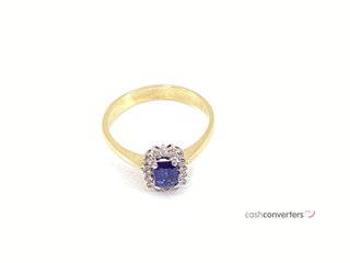 anillo oro 18k con piedra con diamante,zafiro