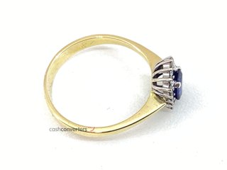 anillo oro 18k con piedra con diamante,zafiro