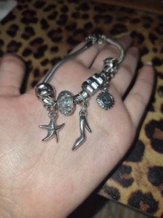Pulsera de acero con charms
