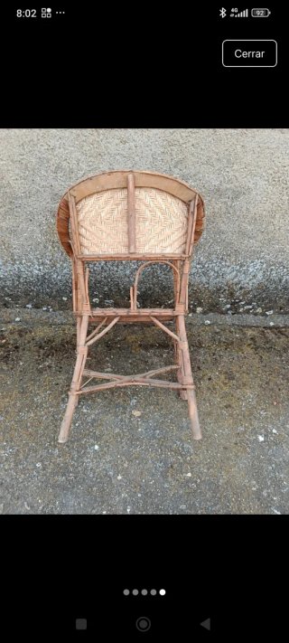 Sillón de mimbre y madera