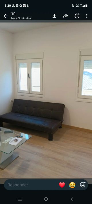 Sofá cama y 2 pufs negros