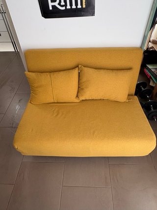 Sofá cama amarillo