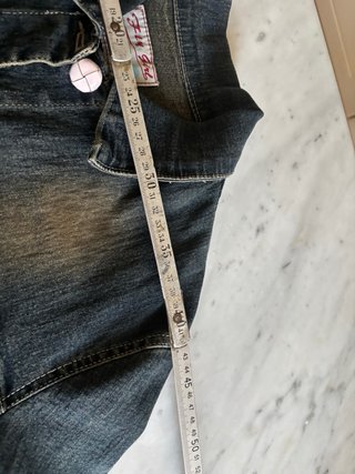 Giubbino jeans con pizzi e decori floreali
