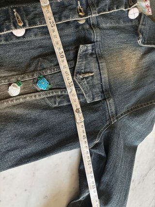Giubbino jeans con pizzi e decori floreali
