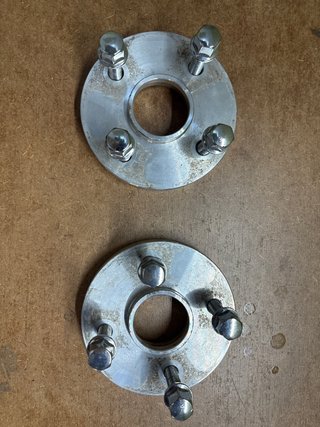 1 par de separadores 4x100 con tornillería