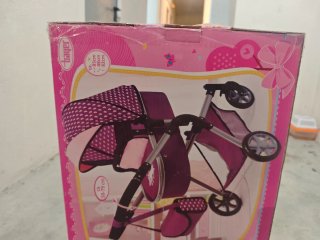 Carrito de juguete para muñecas