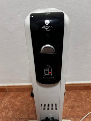 Calentador eléctrico blanco y negro