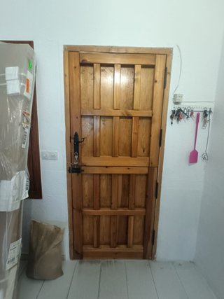 Puerta madera exterior doble apertura