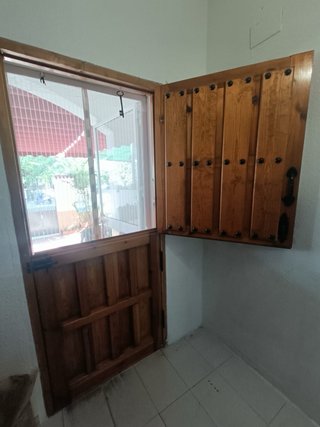 Puerta madera exterior doble apertura