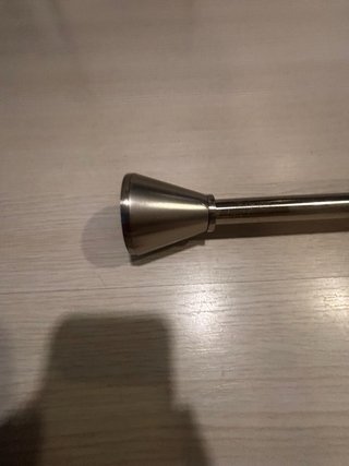 Barra para cortina de metal plateado