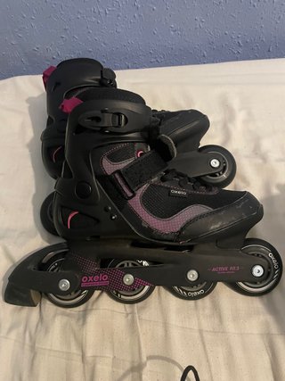 Patinetes negros con detalles rosas