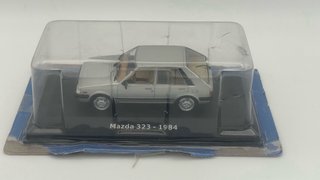 (!!) Mazda 323 Mk6 - Ixo Grecia 1/43